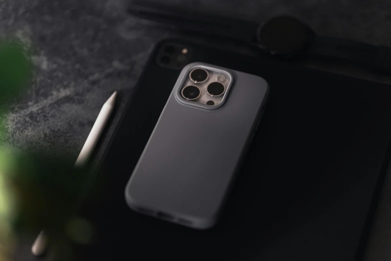 a black phone case with some sort of camera in it