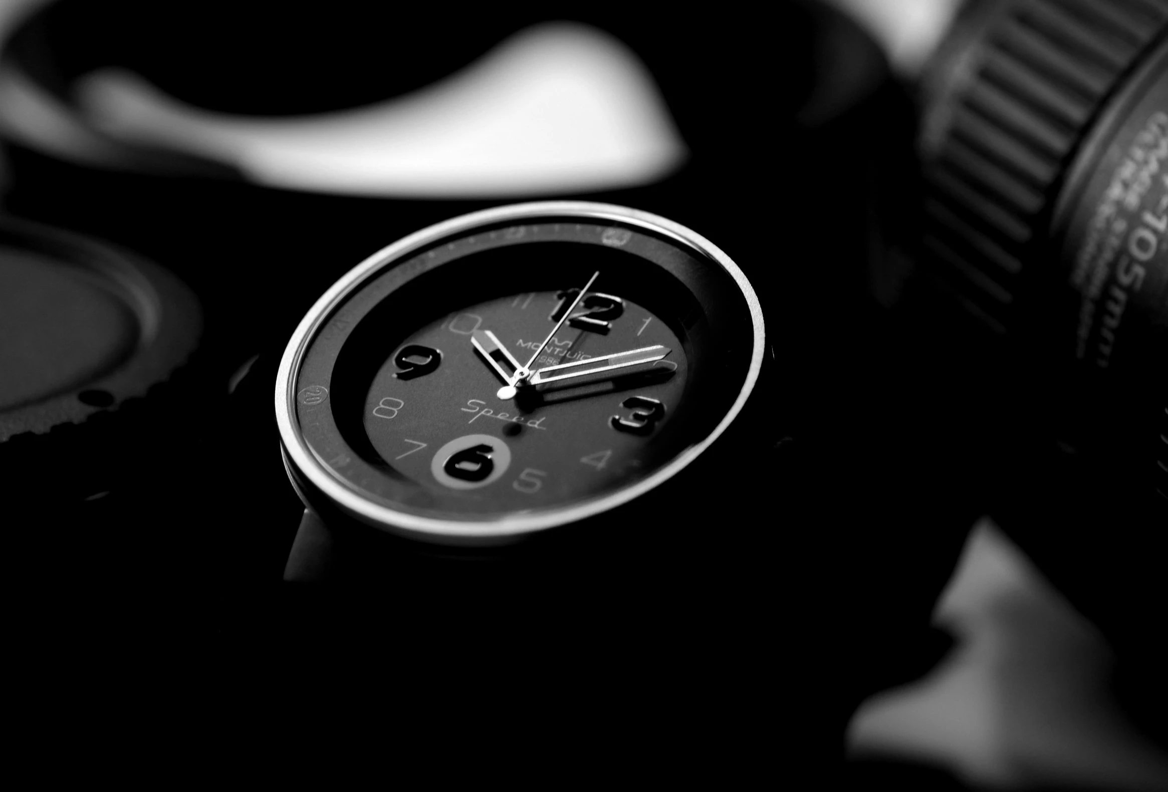 a black and white po with a clock and some camera