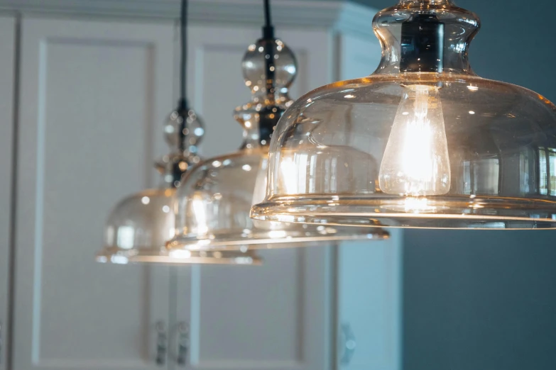 a set of pendant lights in a kitchen