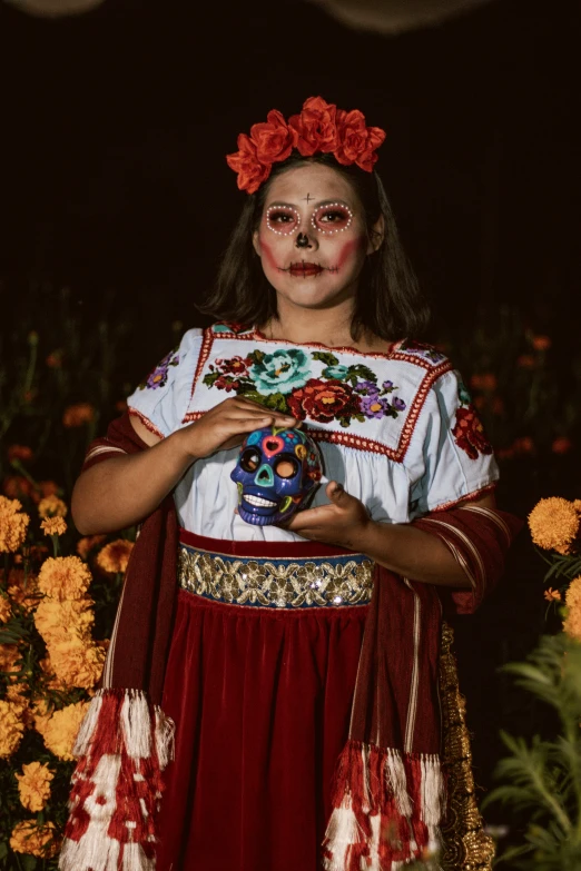 a little girl dressed in costume poses for the camera