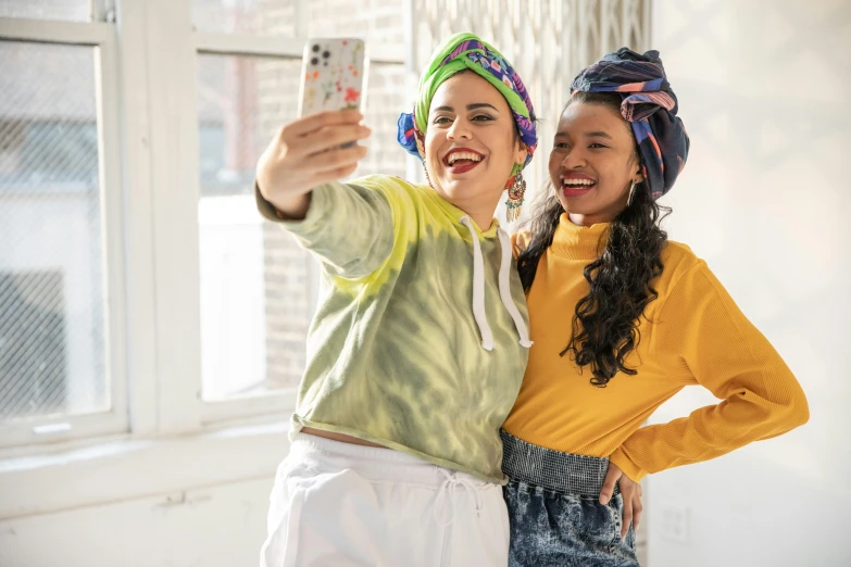 a couple of women standing next to each other