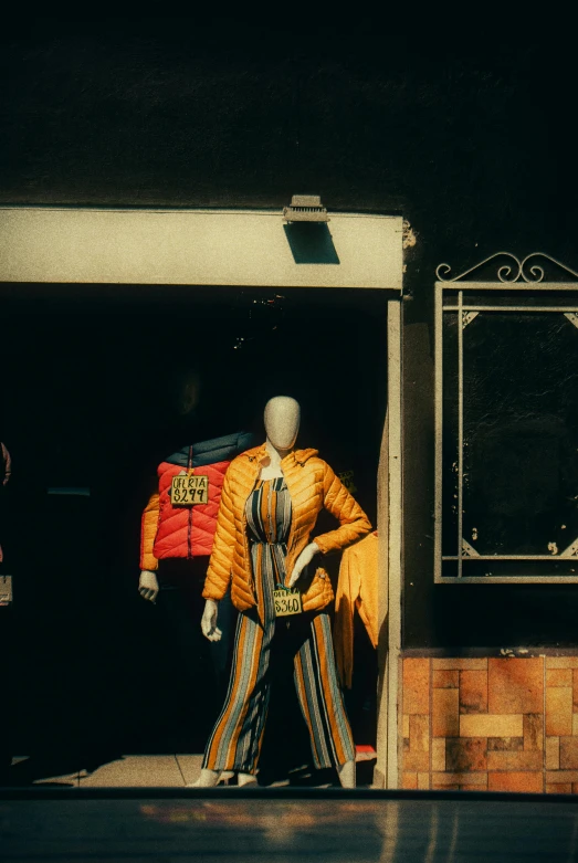 the colorfully dressed costume is shown outside of a door