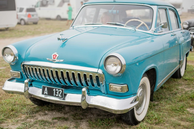 a car that is blue and has a logo on it