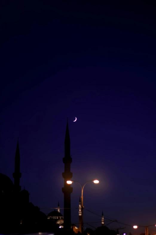 there are many lights in front of the mosque