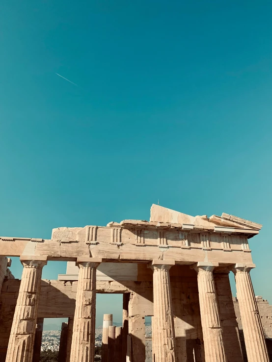 an old structure standing tall on the side of a street