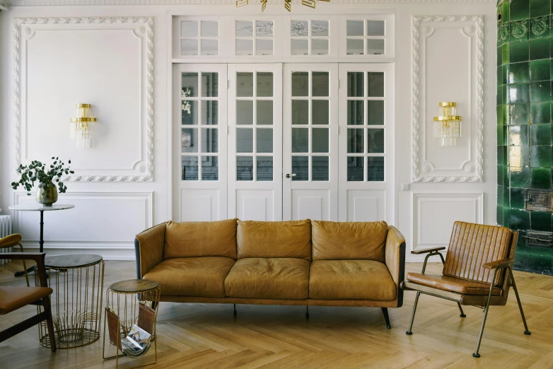 a living room scene with focus on the couch and chair