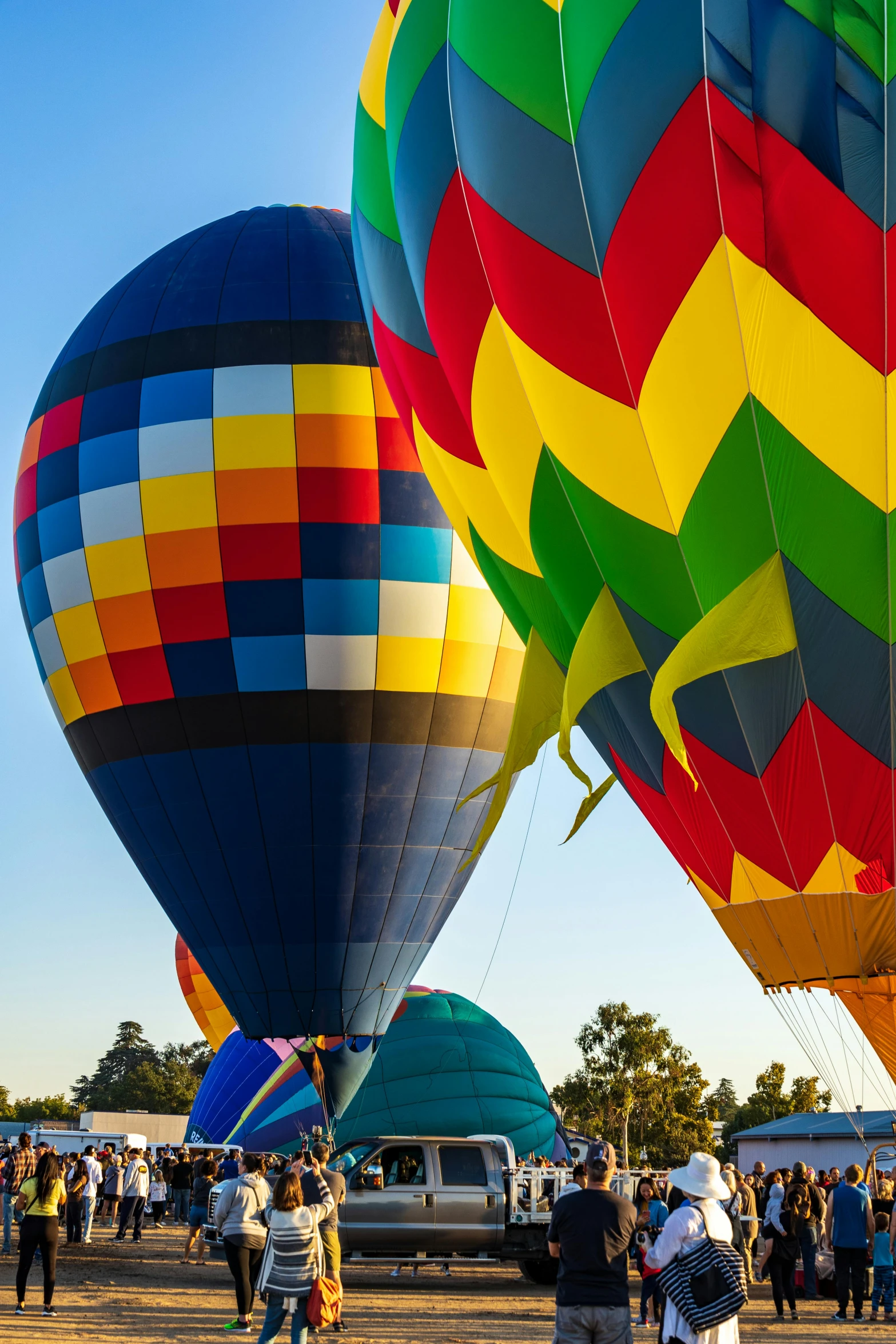 there are many  air balloons being inflated