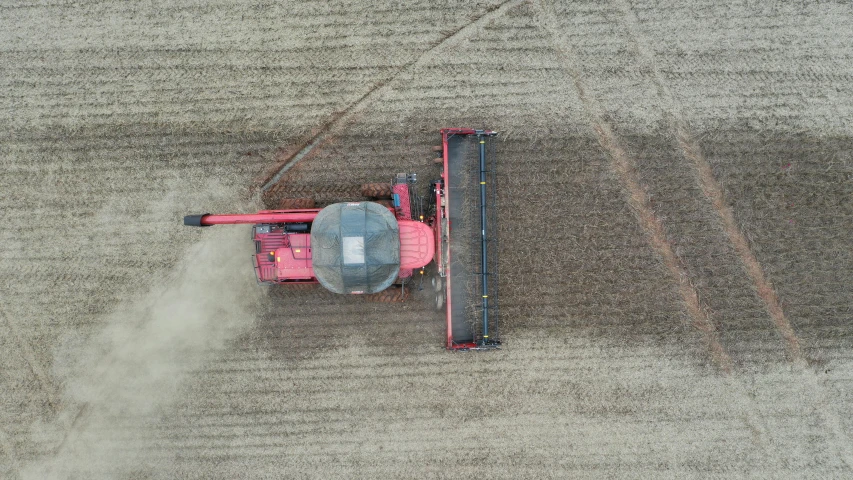 an aerial view of a farmer's vehicle on a farm