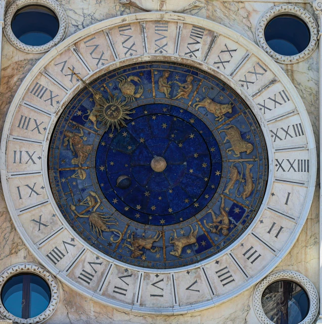 a clock with roman numerals is displayed in a stone wall