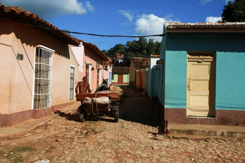 a small street with buildings next to it