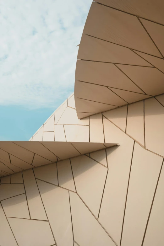 an abstracted background image of a building with curved, curves