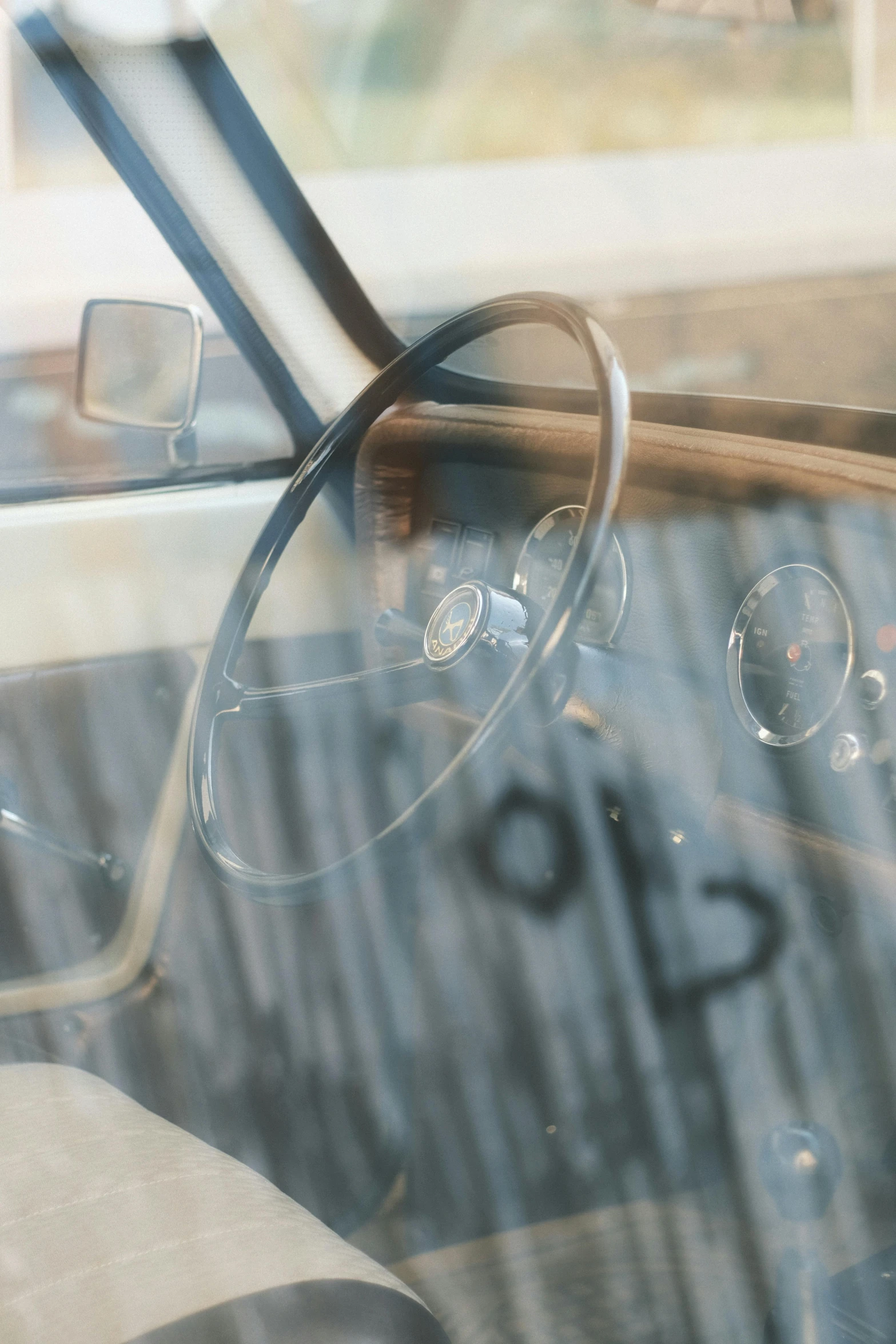 a car that has a steering wheel on the inside