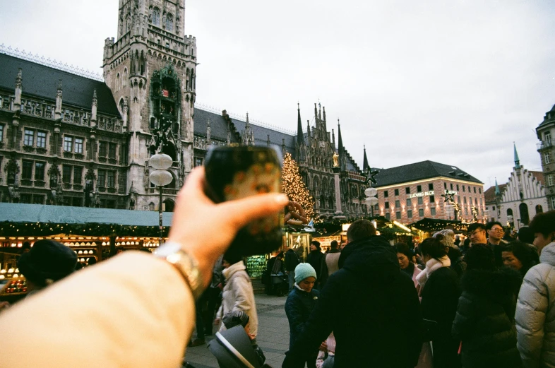 a man taking a pograph with his cell phone