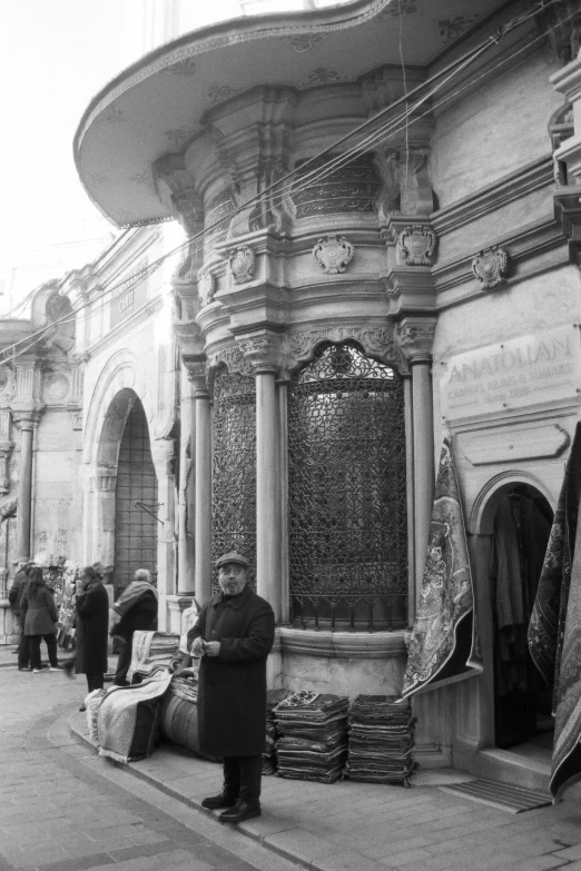 people walking by large outdoor market area