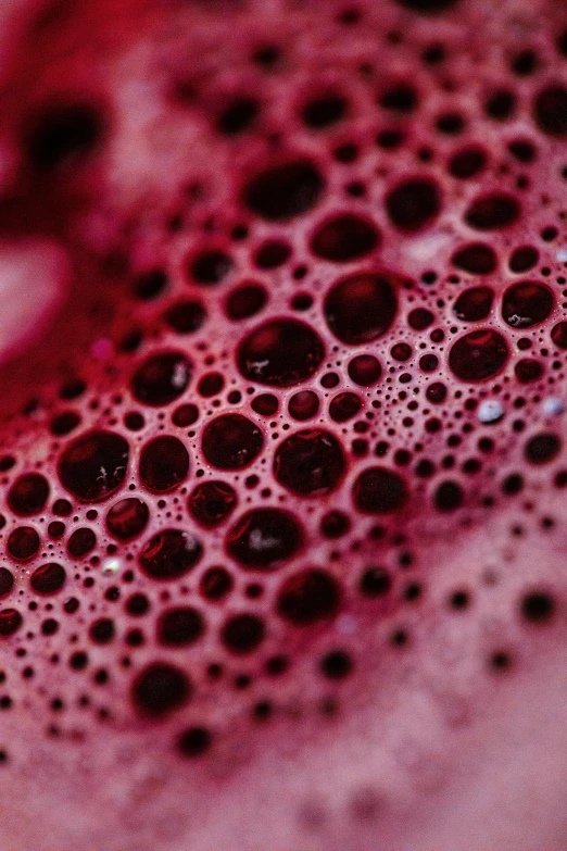 a close up view of a substance made of bubbles