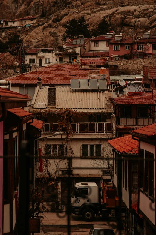 view of rooftops from atop buildings in town