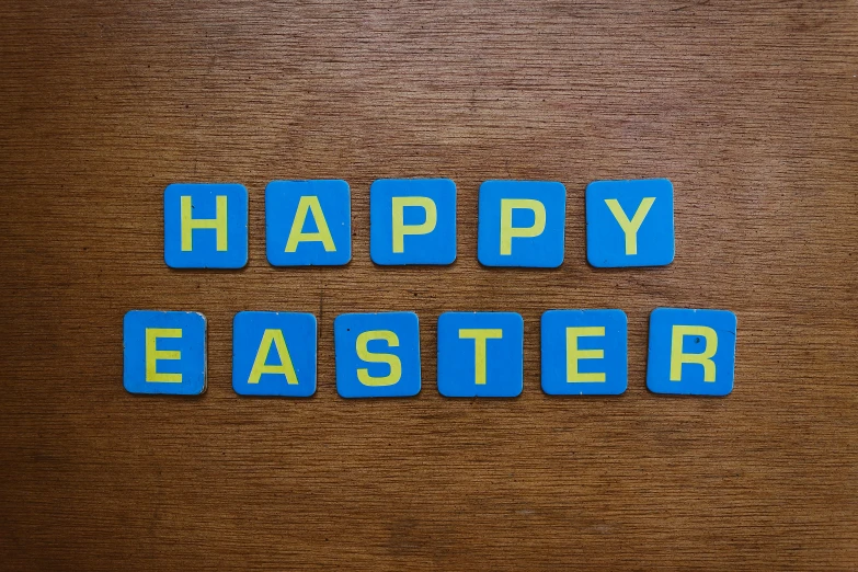 happy easter written with a blue rubber word