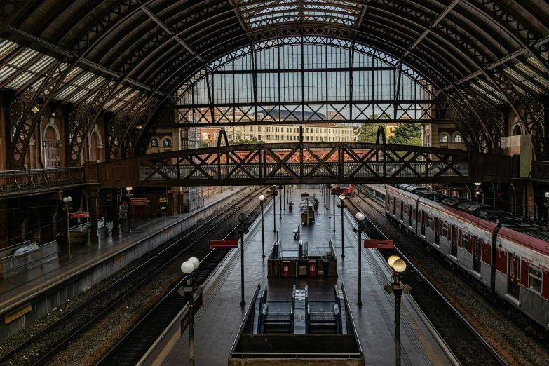 looking down at the inside of an empty train station