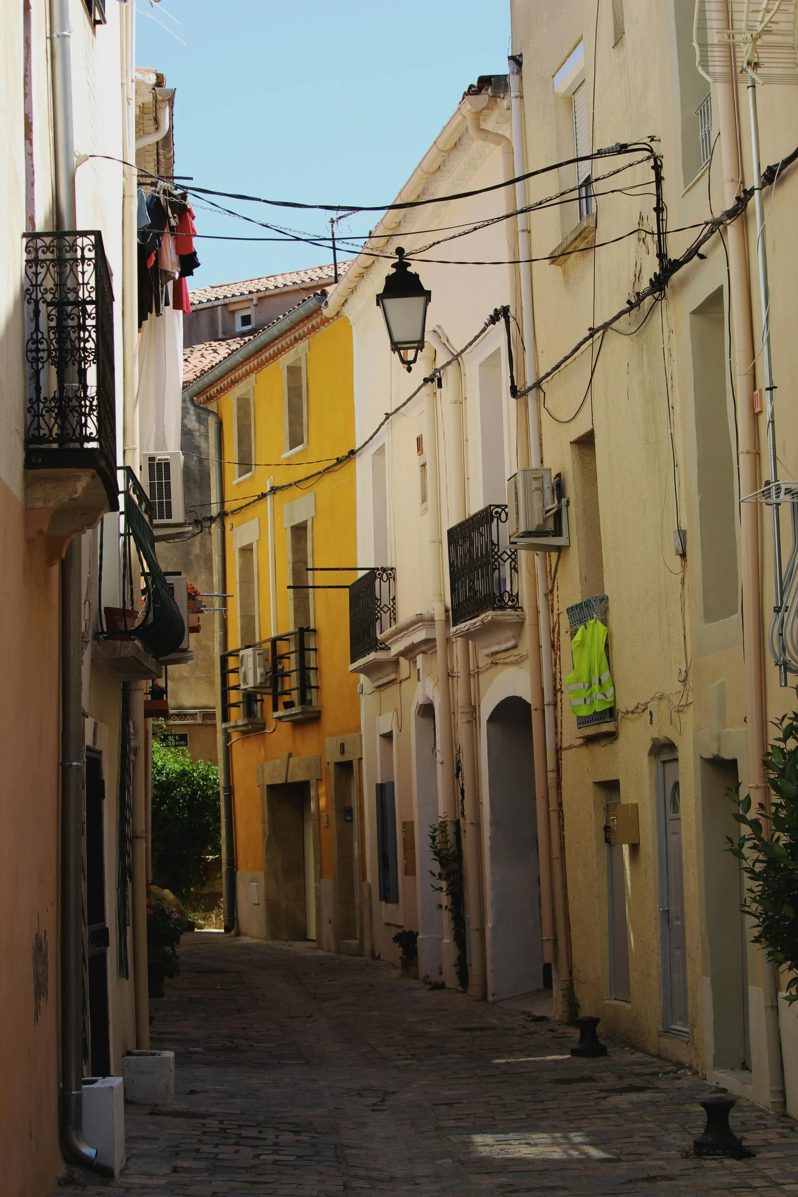 the street has a bunch of buildings on both sides