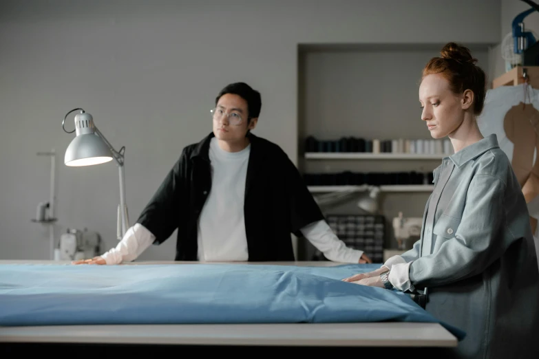 two woman on a surgical bed staring at the camera