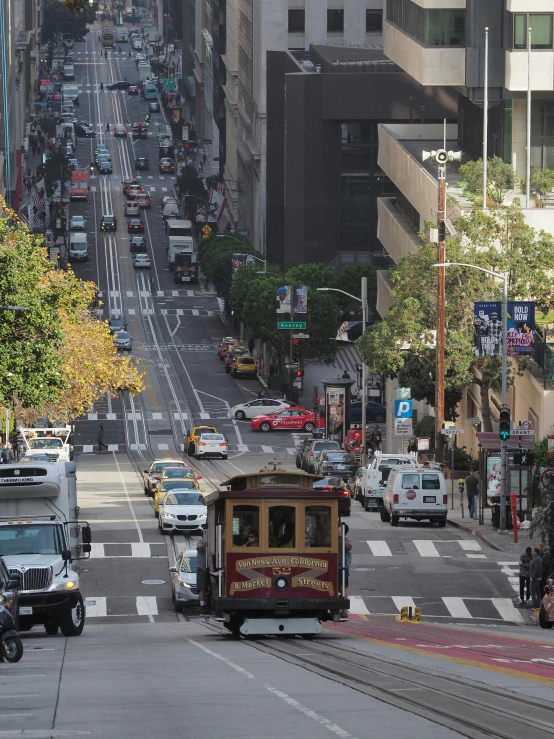 an old cable car in the middle of a city