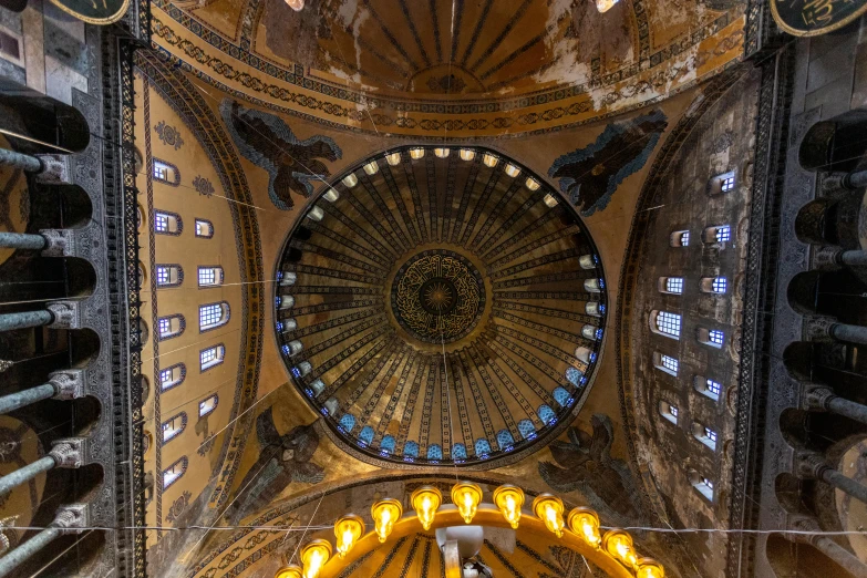 the roof of the inside of an old cathedral