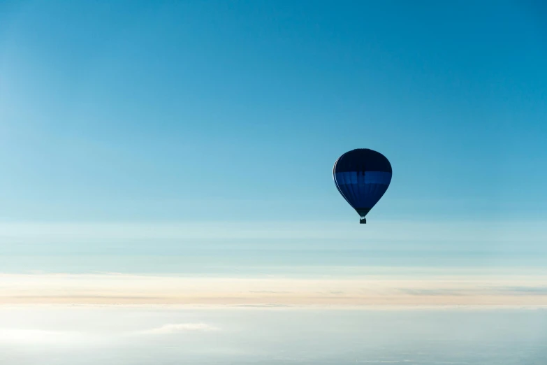 a  air balloon floating through the sky