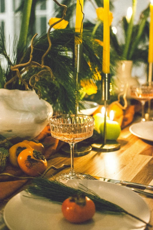 a table with plates, knives and glasses on it