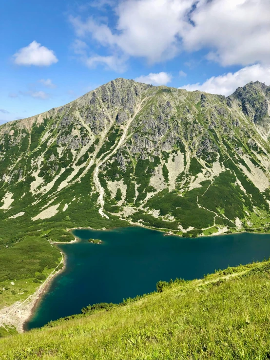 a view of an area with a mountain and a lake