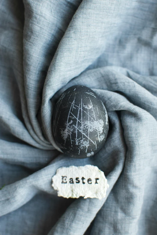 an easter egg with the word'easter'painted on it