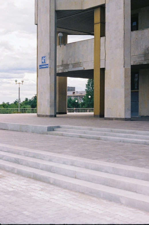 there is a skateboarder riding on some concrete steps