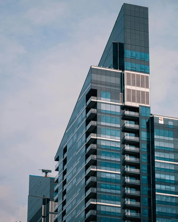 two building's sides with a plane on one side