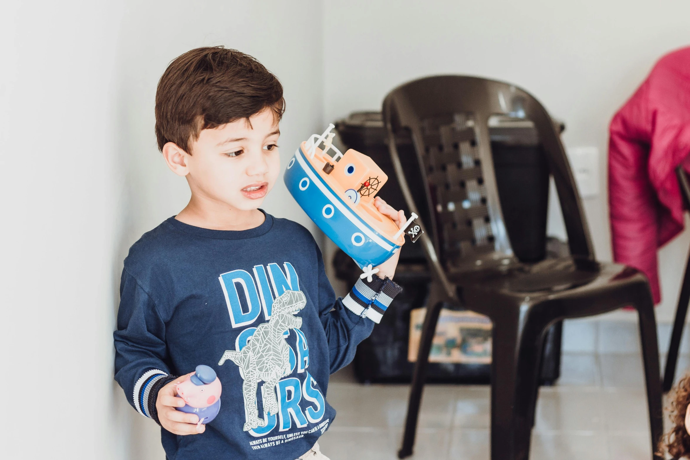 a  holding an ice cream cone up to his face