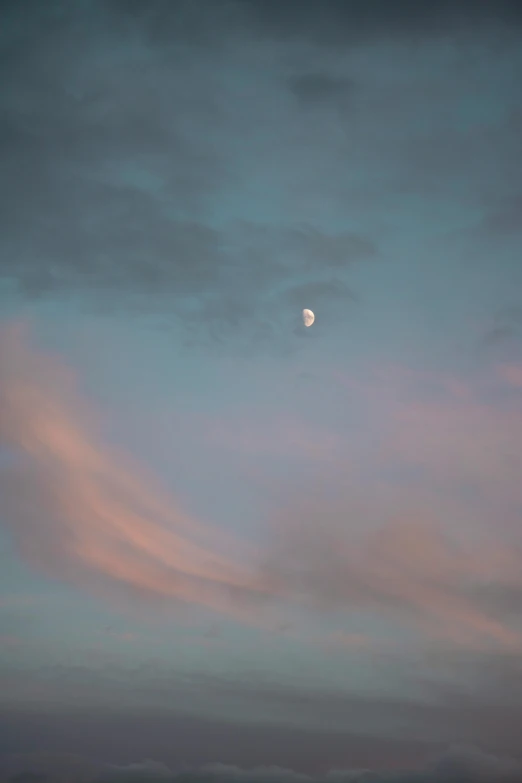 the sky is mostly pink and blue at twilight