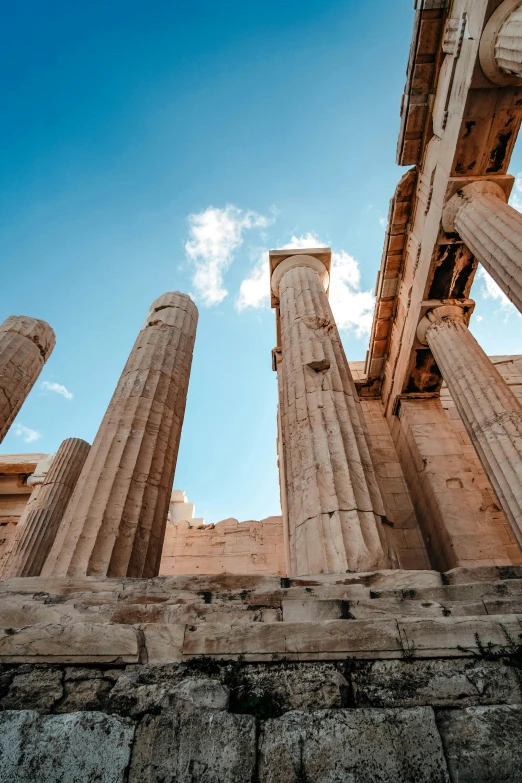 several pillars that are standing against the sky