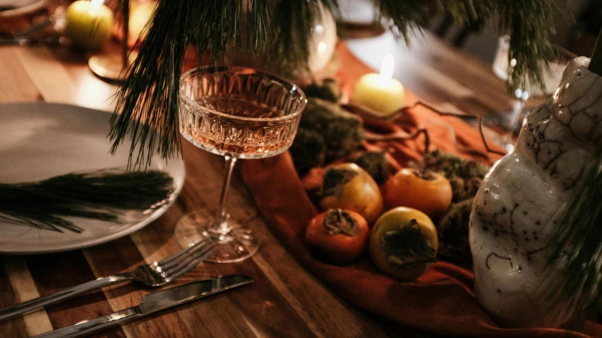 a table with some dishes and glasses on it