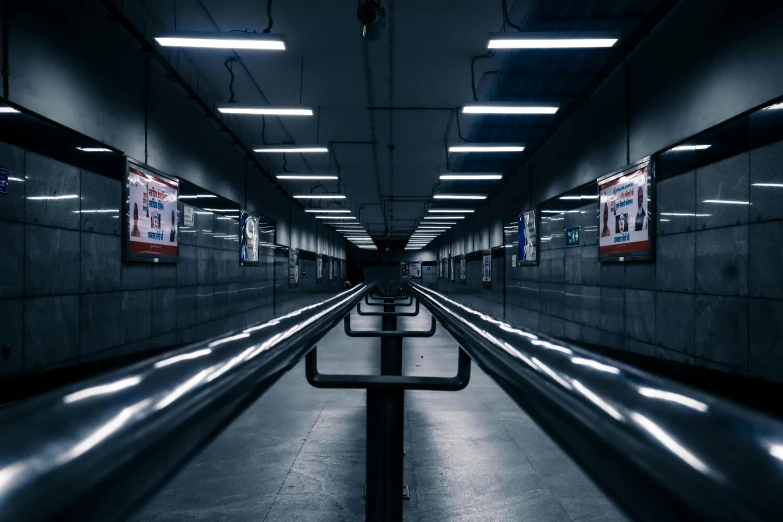 the interior of a train station with multiple light effects