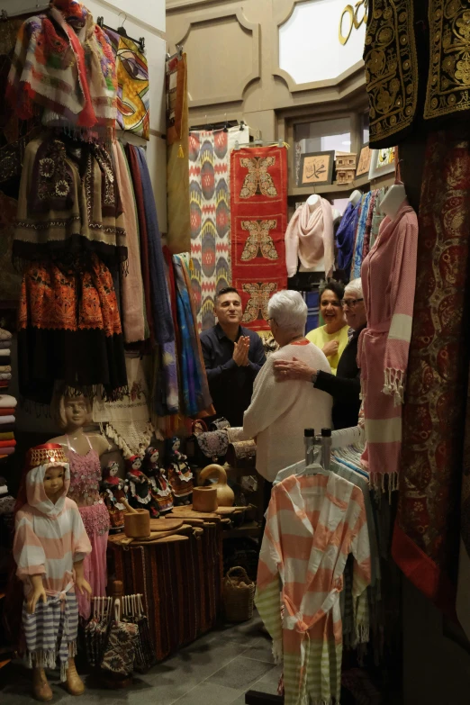 people looking at fabrics at the grand bazaar