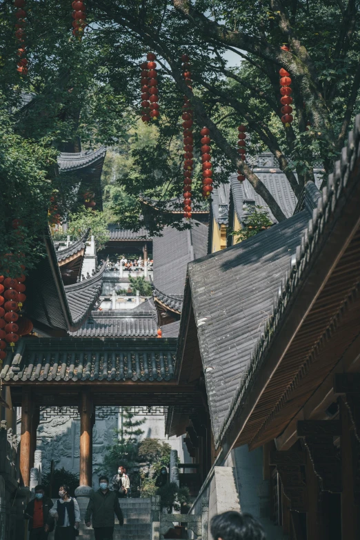 the courtyard has people walking down it