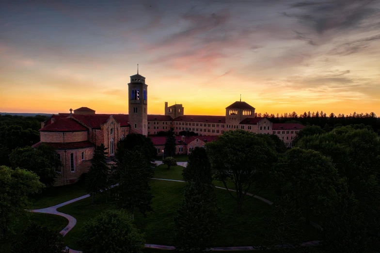 an aerial po of a college cam at sunset