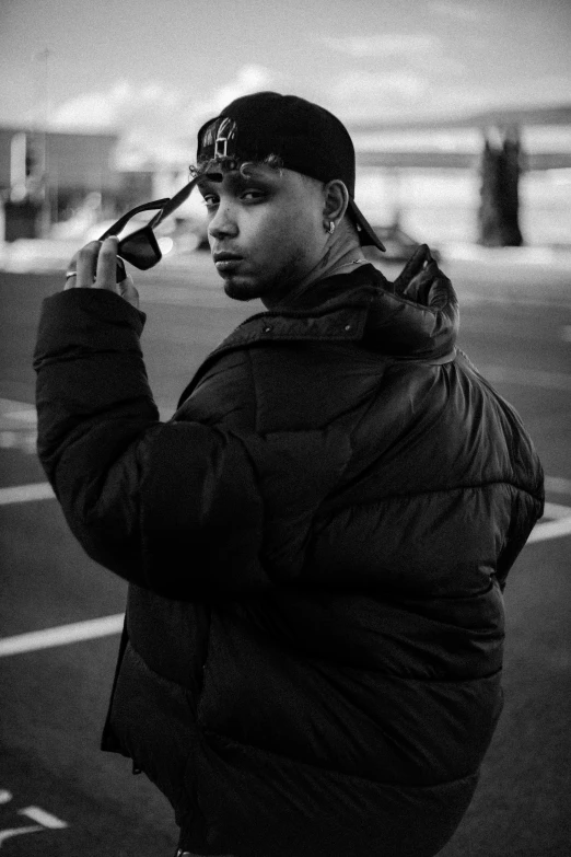 a woman talks on the phone on a street