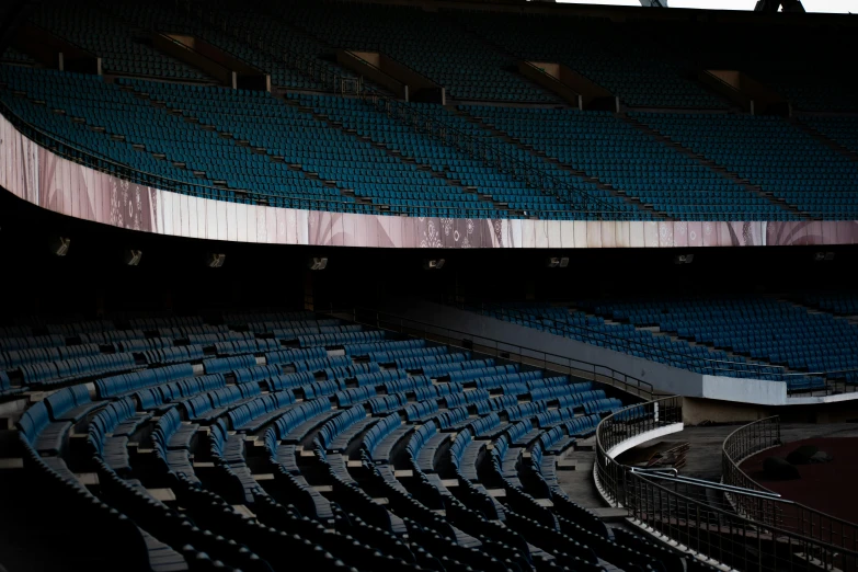 a room filled with lots of seats on top of a stage