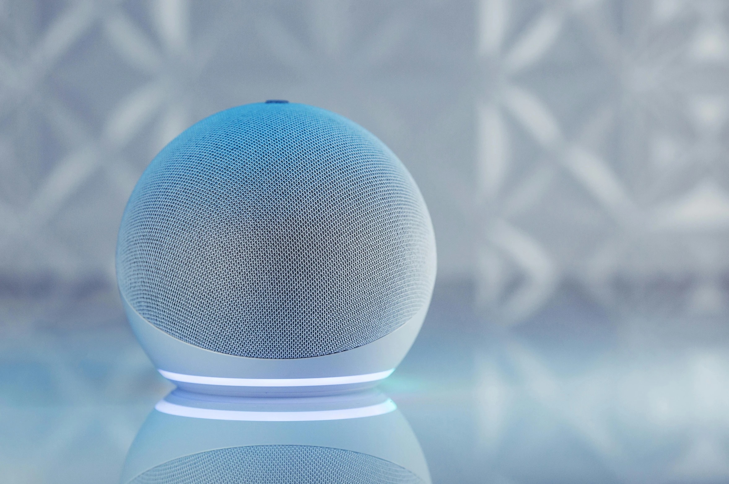 an egg shaped bluetooth speaker sitting on a table