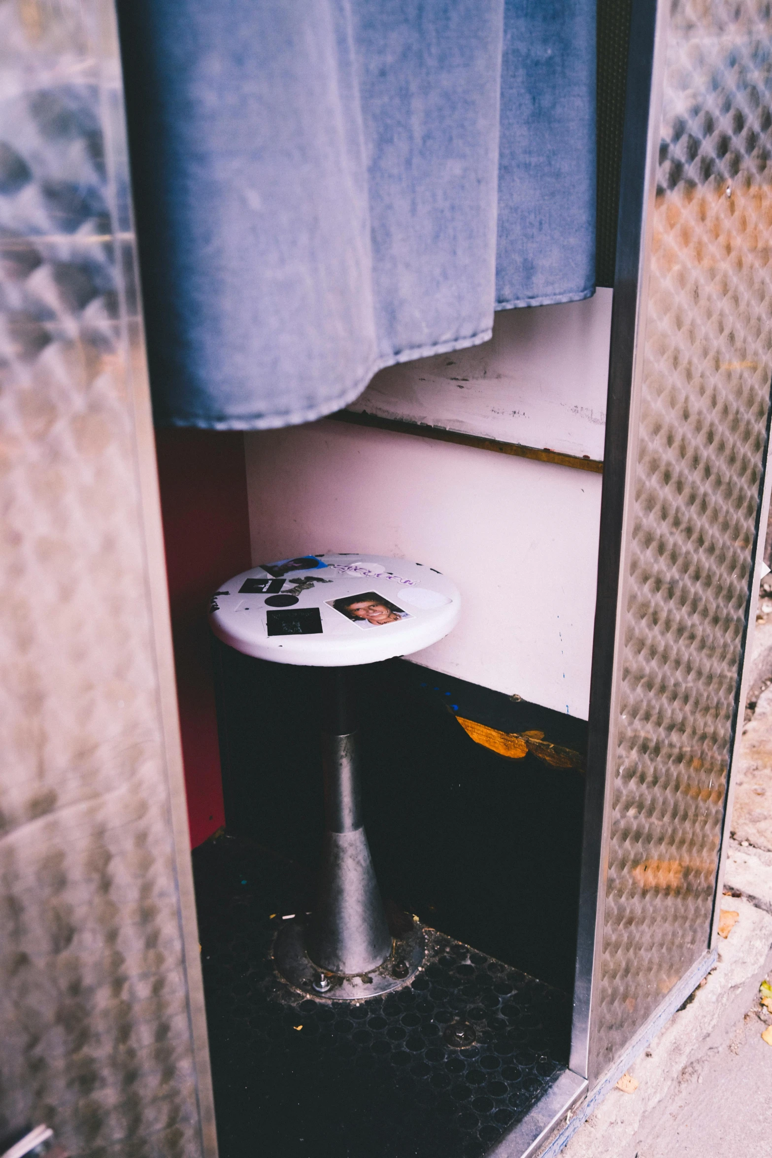 a bathroom with a white sink sitting next to a window