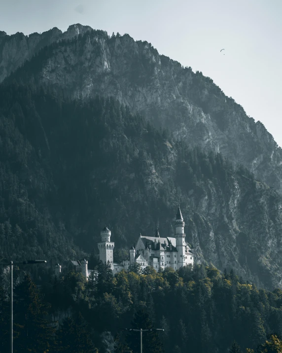 a castle is on the top of a mountain