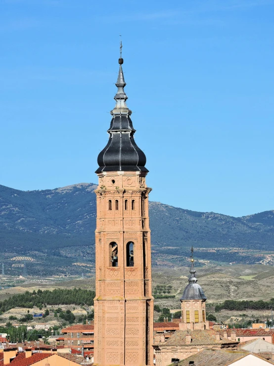 a tall clock tower with a sky background