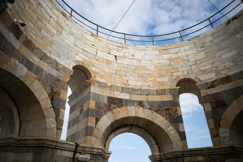 a stone wall that has been built into a round structure