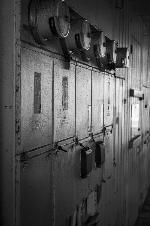 a long wall with a bunch of old fashioned light bulbs