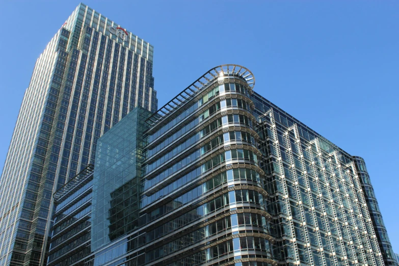 a tall building with many windows, in the city