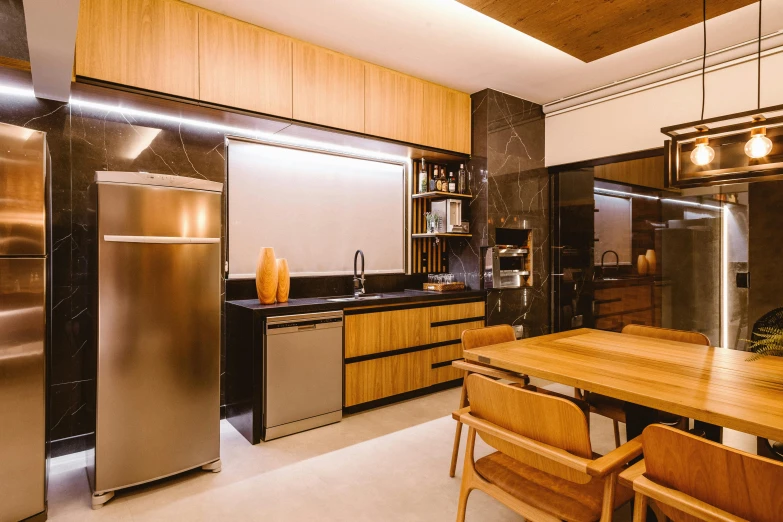 modern kitchen features stainless steel refrigerators, stainless steel cabinetry and cabinets